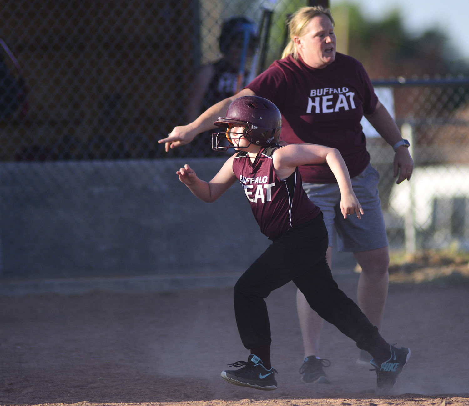 Buffalo baserunner Skyla Carpenter runs through third and onto home